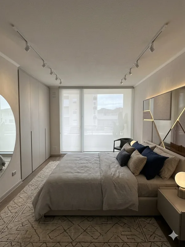 Cortinas roller translúcidas instaladas en un ventanal moderno iluminando una sala de estar - Imagen 2